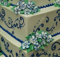 square tiered wedding cake blue filigree