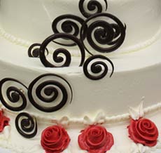 chocolate spirals and roses wedding cake
