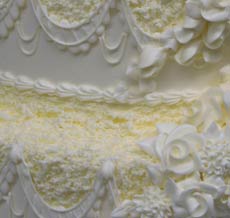 lace and roses wedding cake