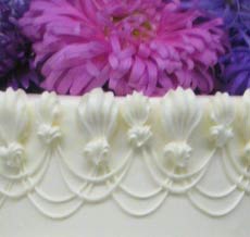 drop strings and flowers wedding cake