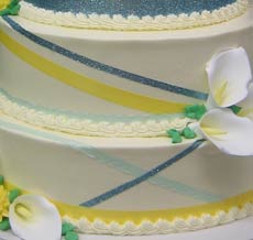 ribbon and calla lilies wedding cake